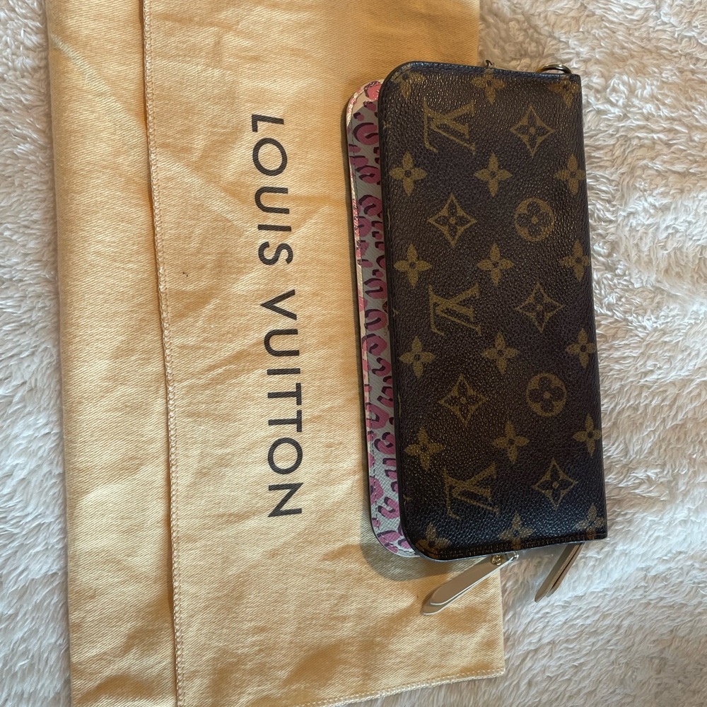 Louis Vuitton authentic Isolite pink wallet.